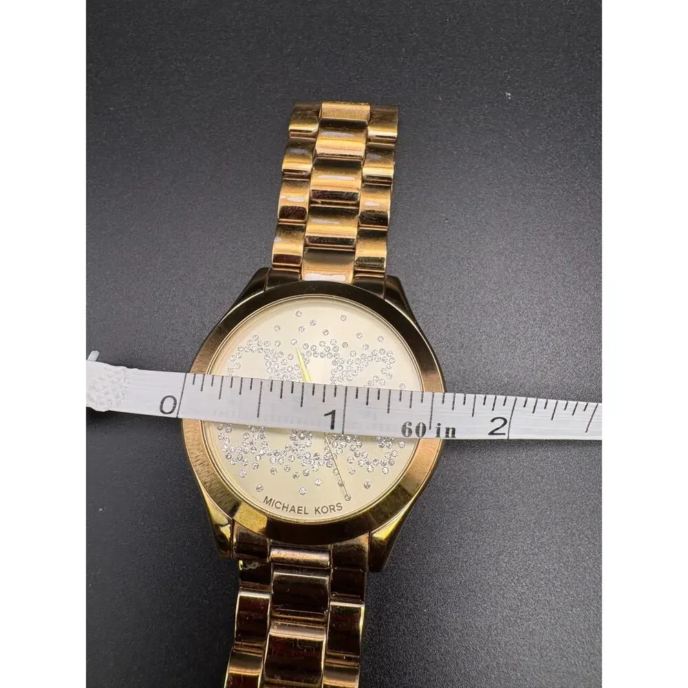 Michael Kors Slim Runway MK3590 Gold toned Stainless Steel Watch (needs battery)